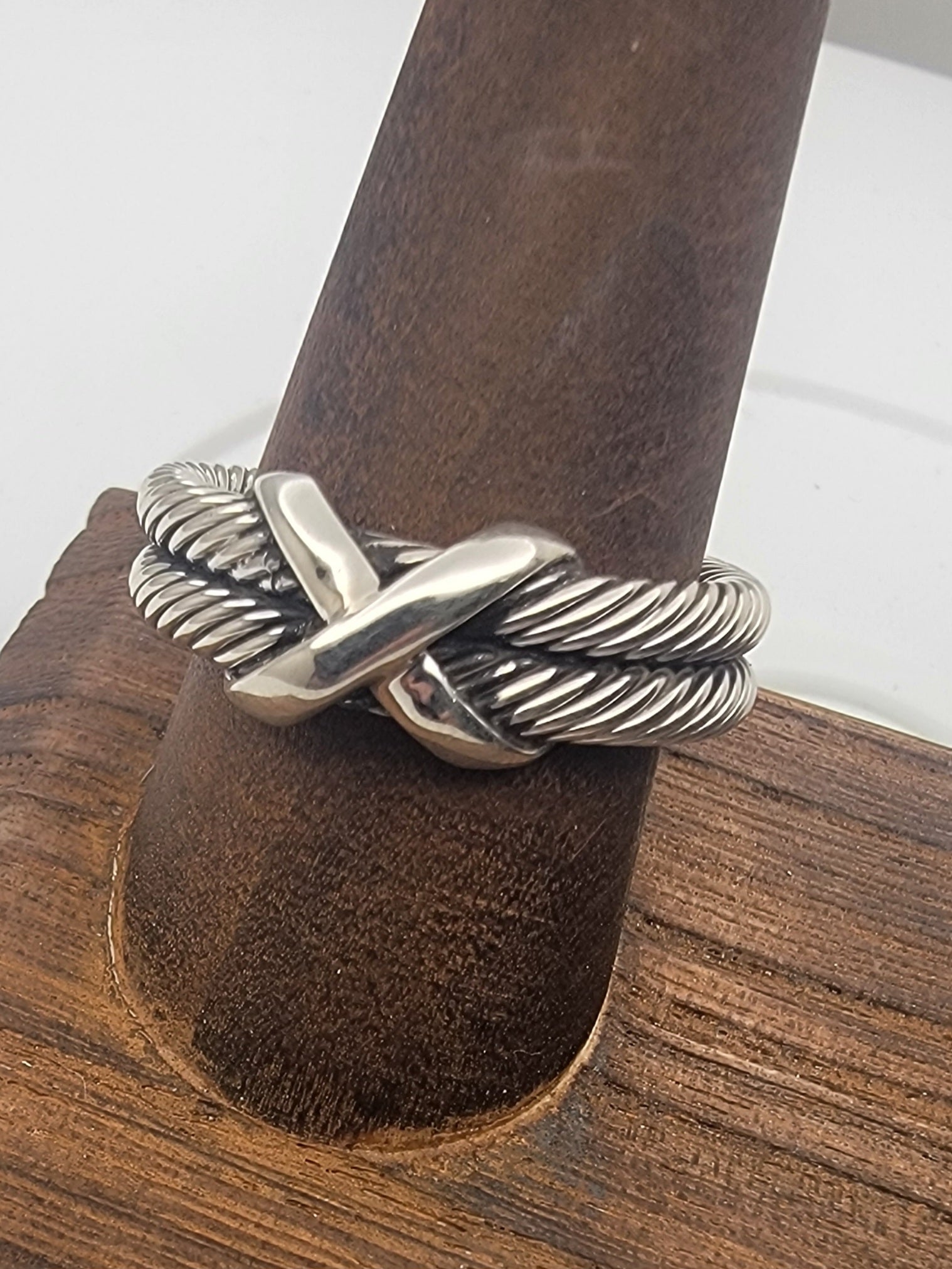 Model wearing the 925 Sterling Silver Double Twist Rope Ring, demonstrating its bold and eye-catching style.