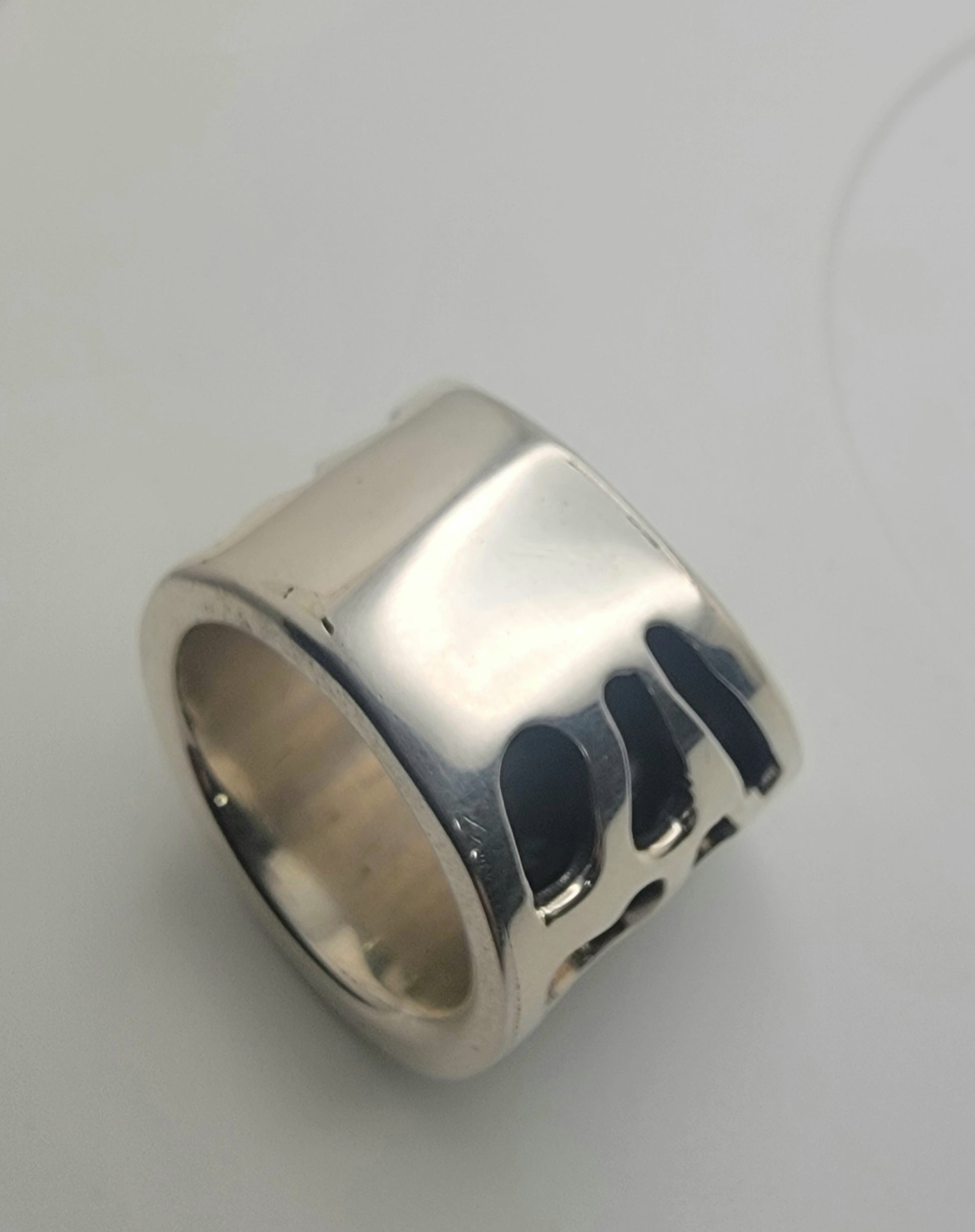 Close-up view of the 925 Sterling Silver Abstract Design Ring, featuring sculptural cutouts and polished finish.