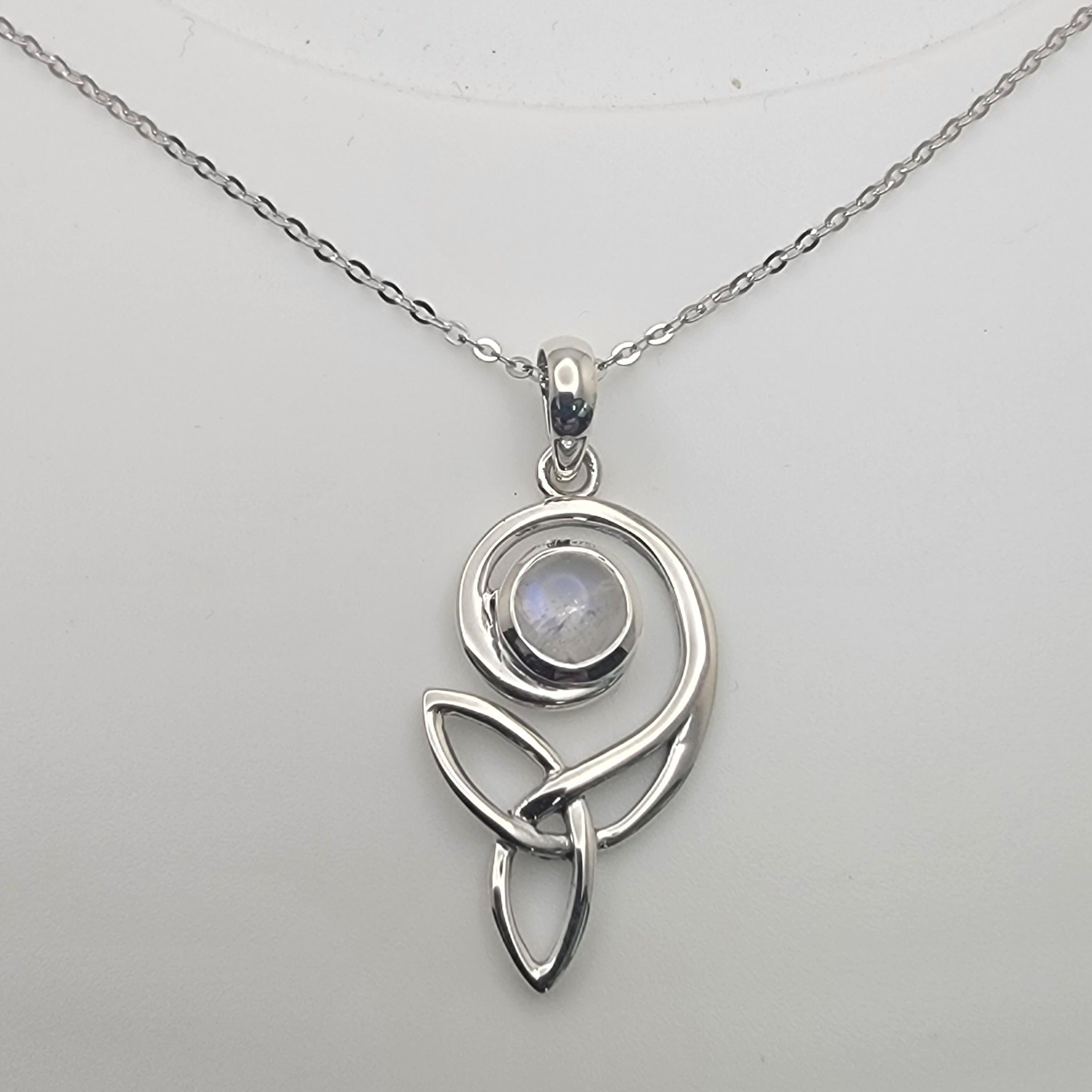 Celtic Swirl Sterling Silver Moonstone Necklace featuring a glowing moonstone set in a swirl design, perfect for intuition and balance.